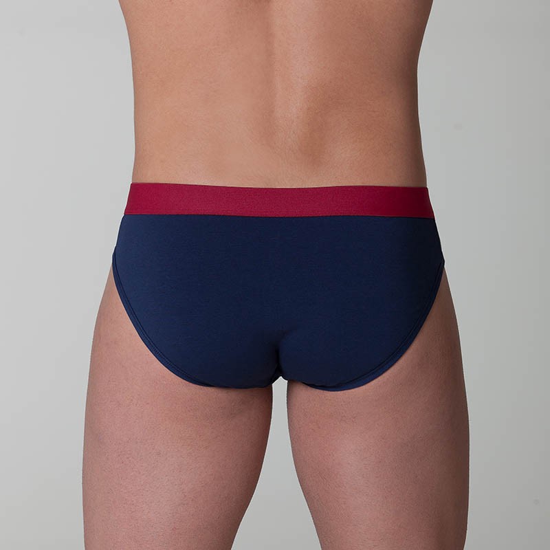 Slip unito cuciture in contrasto ed elastico blu rosso